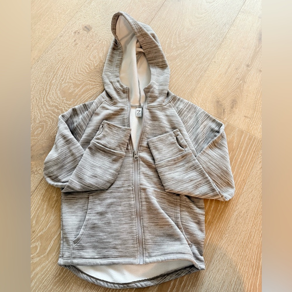 Z by Zella Girls Size M 8/10) zip up
Jacket in Heathered Grey. New without tags!